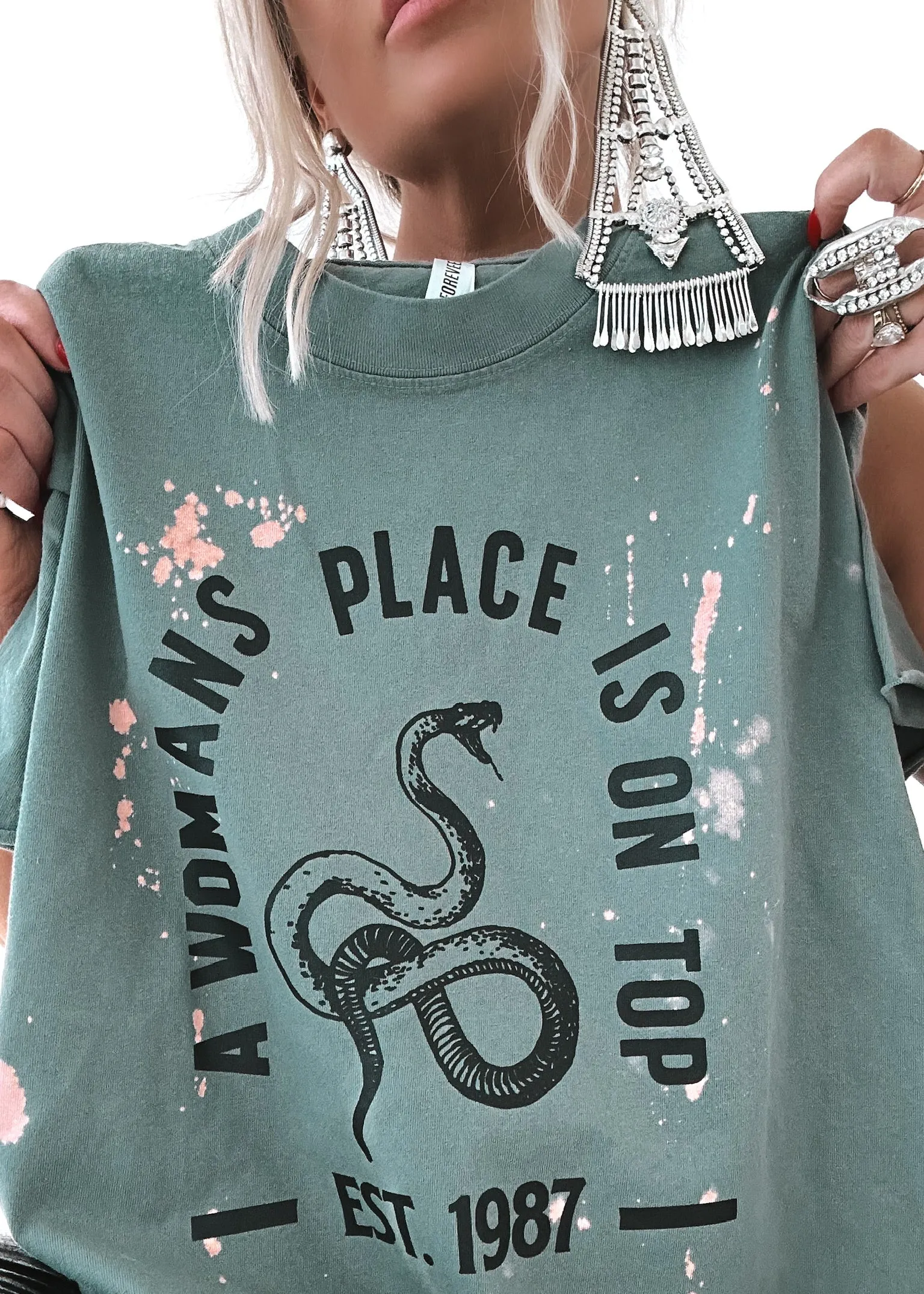 A WOMAN'S PLACE IS ON TOP BLEACHED OUT SIDE SLIT TEE