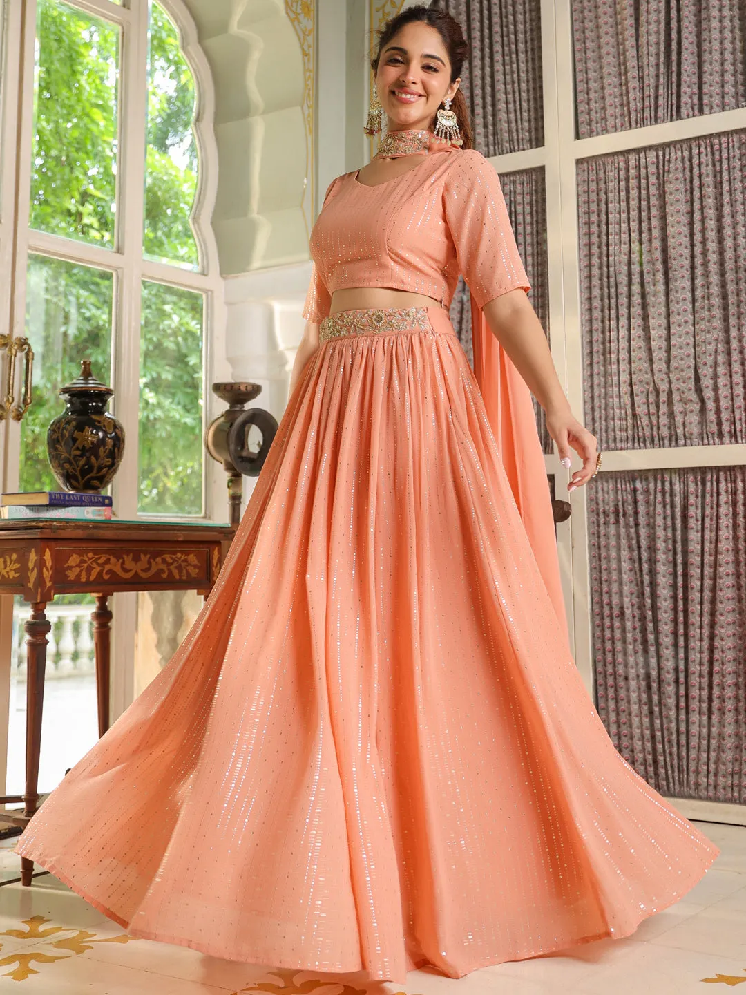 Peach Georgette Foil Printed Gathered Embellished Lehenga Choli Set